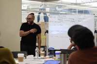 Person presenting and laughing