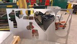 Metal sculpture with cutouts in different ambiguous shapes.