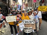 Group of protestors against with signs. 